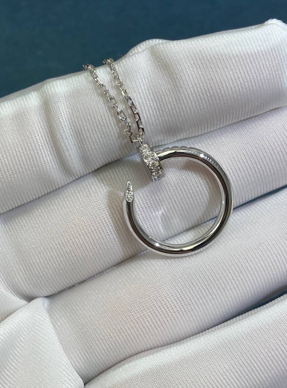 Nail pendant with diamonds
