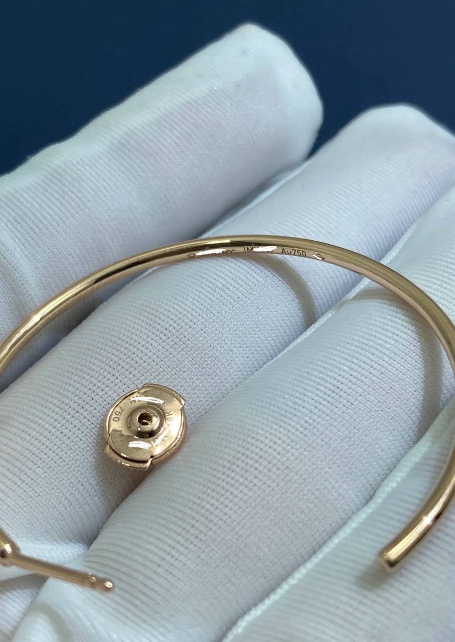 Nail hoop earrings with diamonds