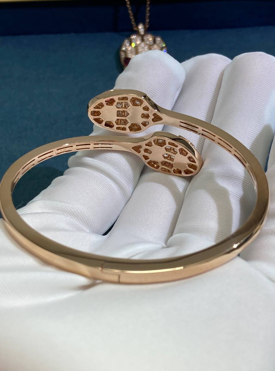 Serpenti double head bracelet with diamonds and rubelllites