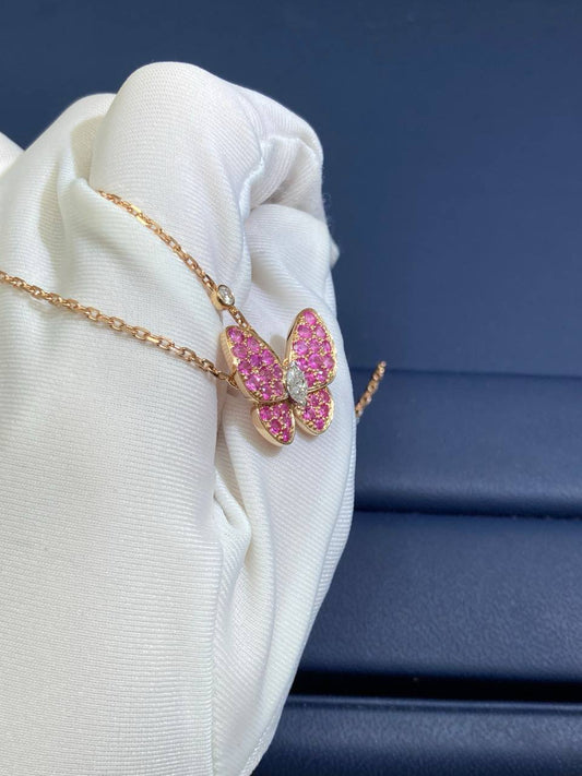 VC butterfly pendant with 2 diamonds and pink sapphires