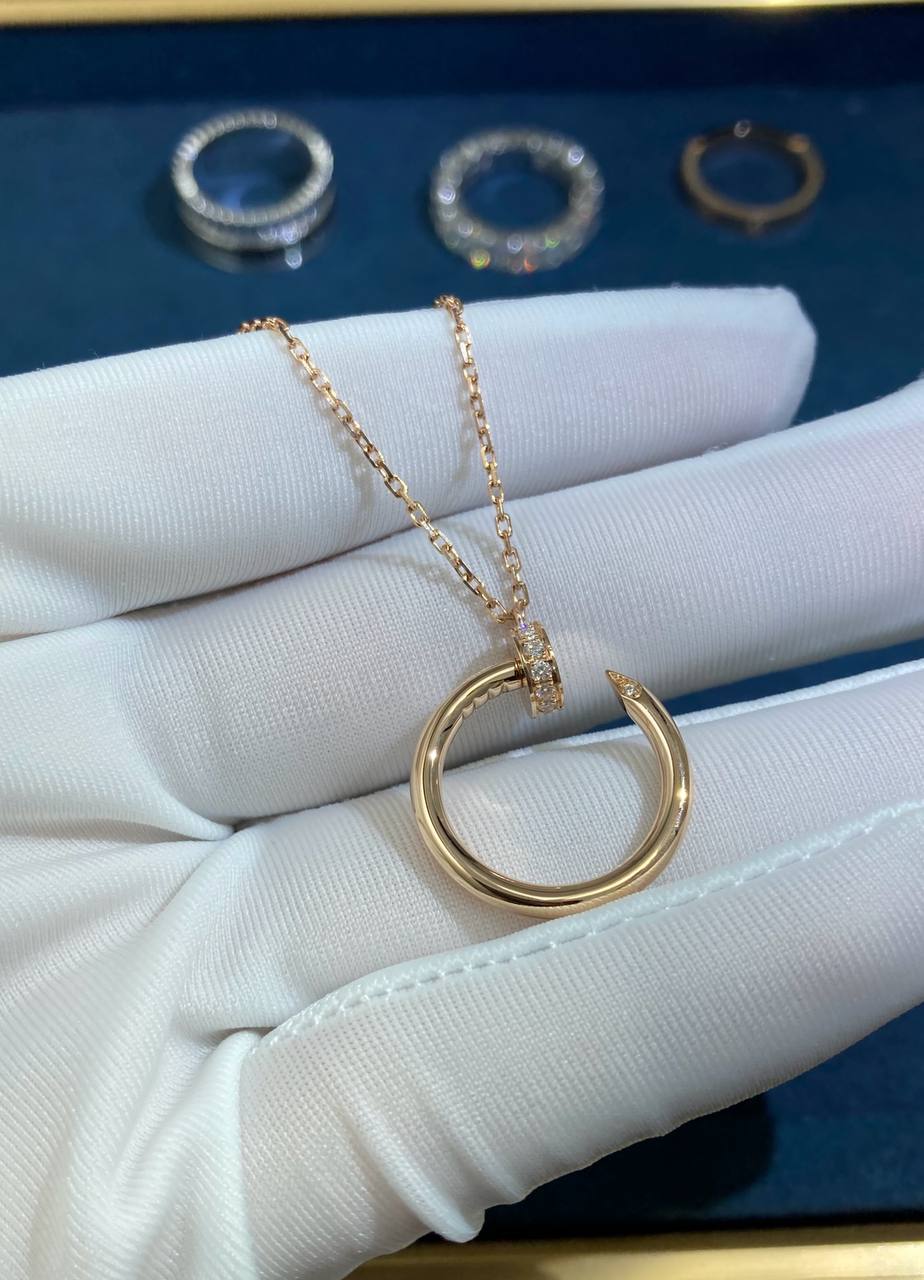 Nail pendant with diamonds
