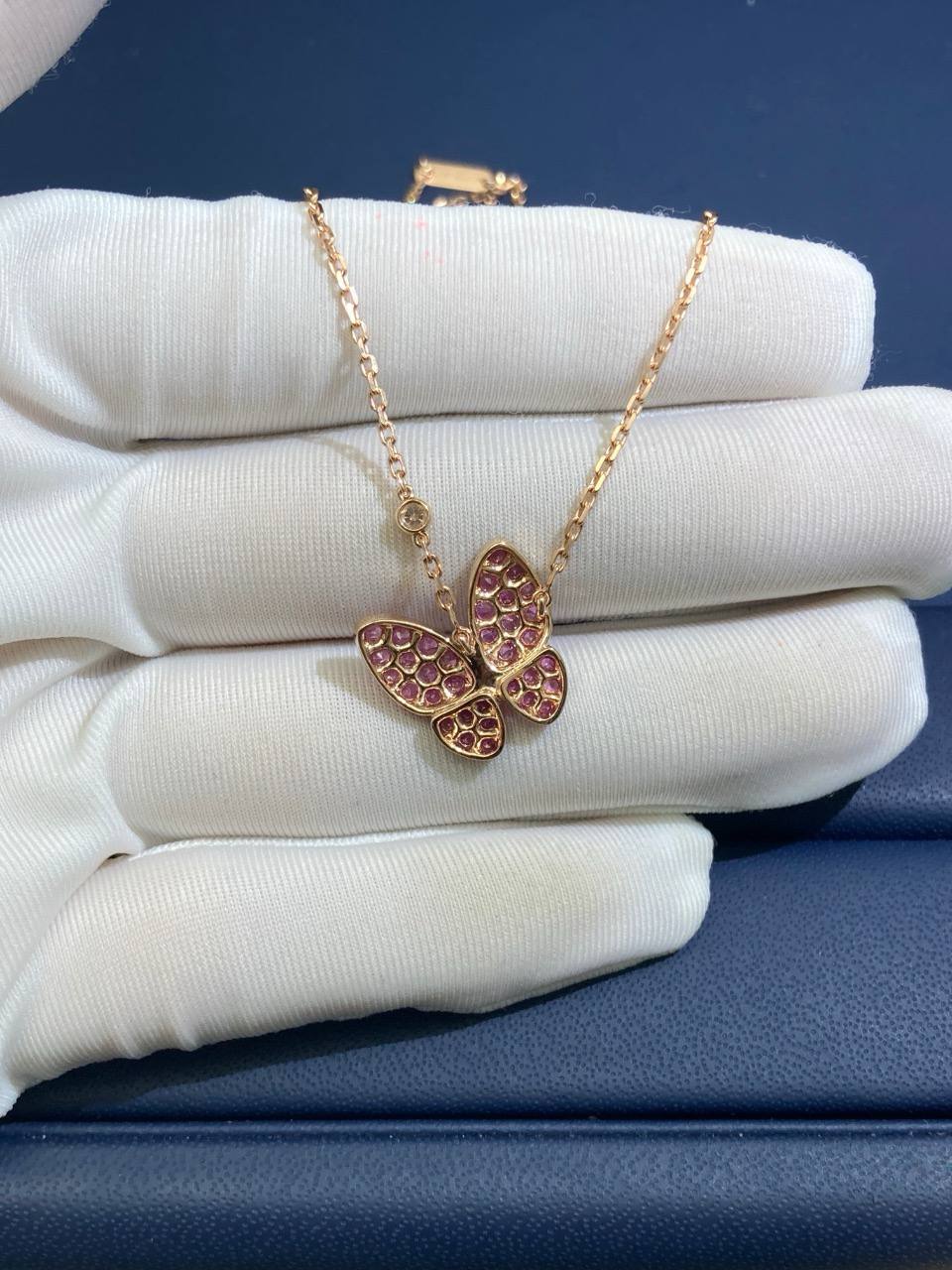 VC butterfly pendant with 2 diamonds and pink sapphires