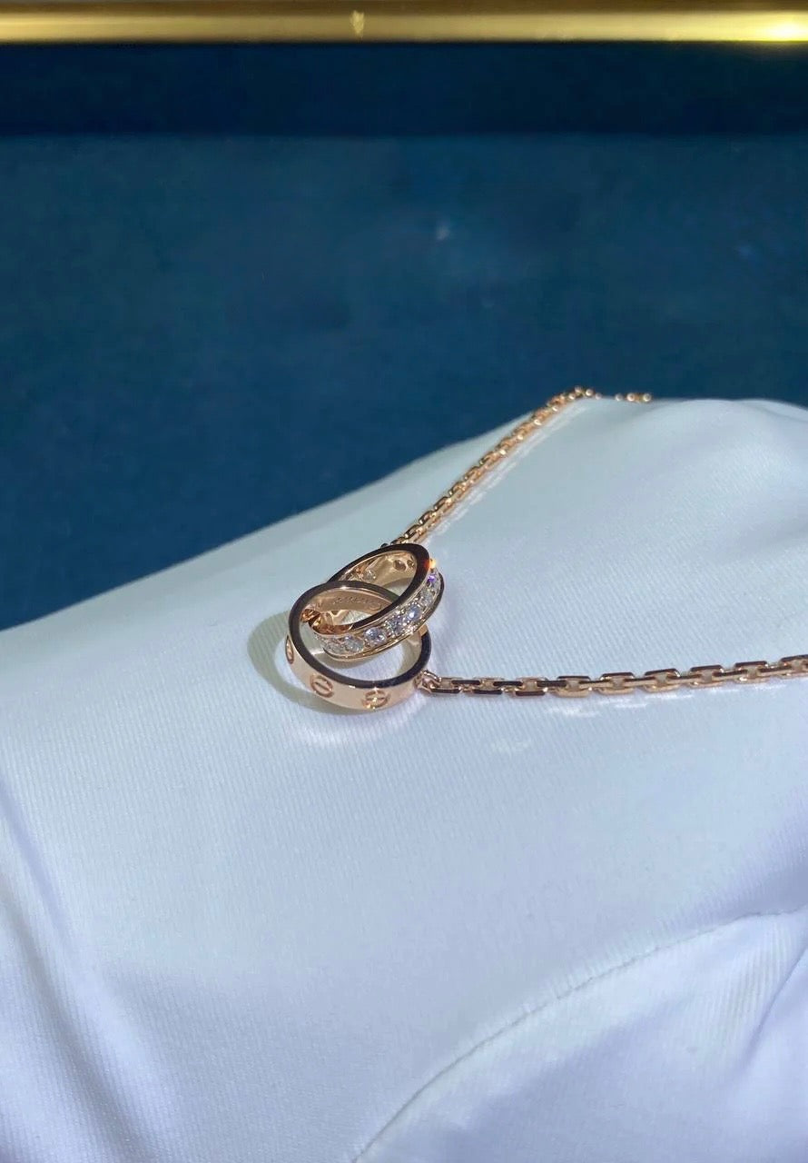 Love half pave diamond double ring chain pendant