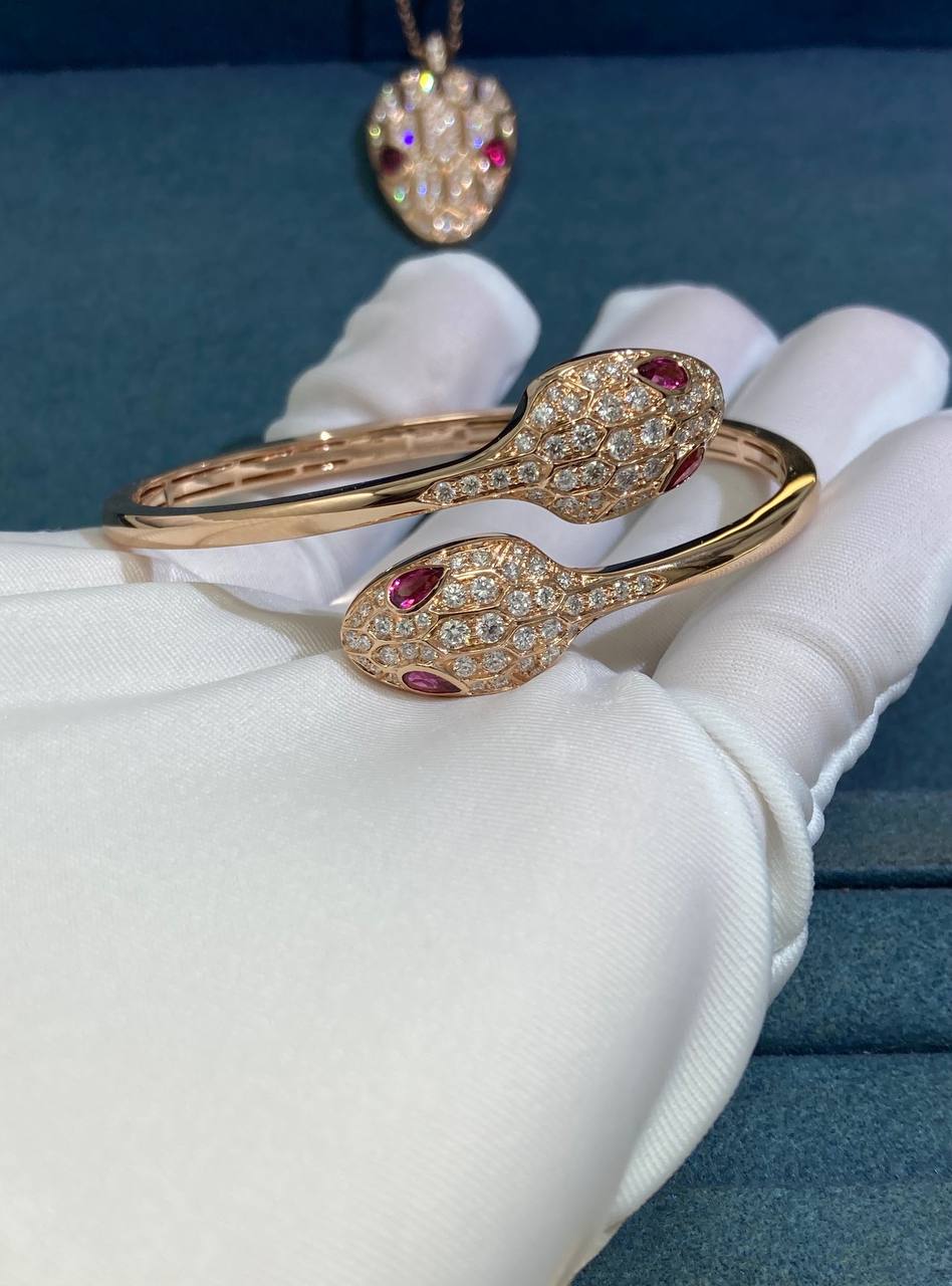 Serpenti double head bracelet with diamonds and rubelllites