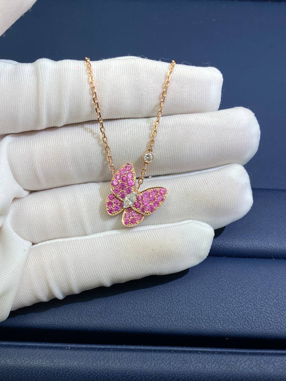 VC butterfly pendant with 2 diamonds and pink sapphires