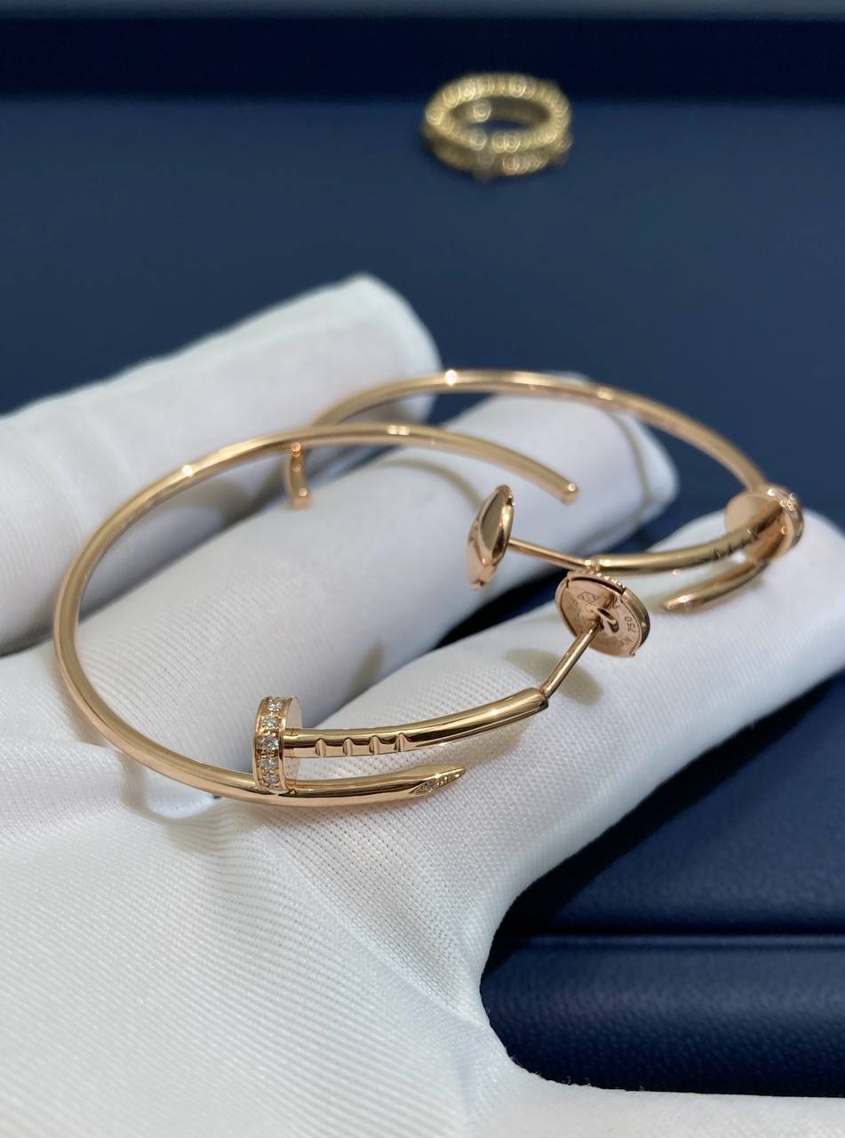 Nail hoop earrings with diamonds