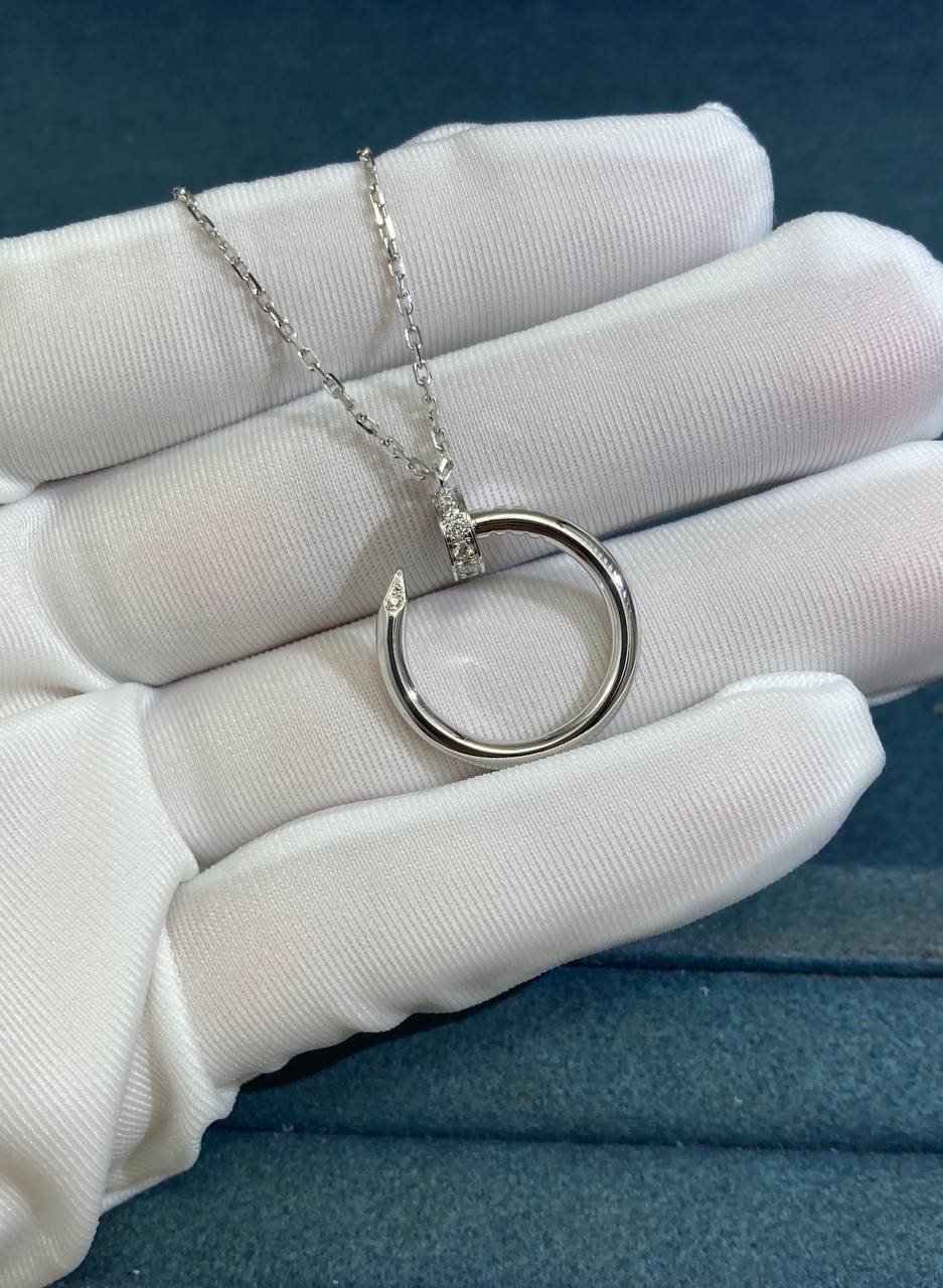 Nail pendant with diamonds