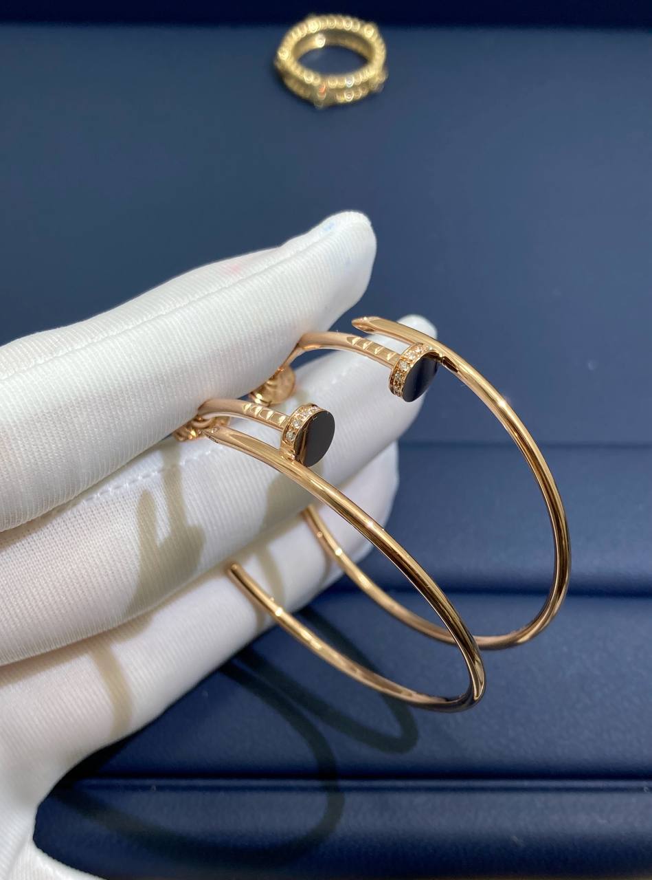 Nail hoop earrings with diamonds