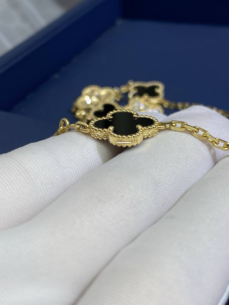 VC 10 motif Onyx necklace with diamonds