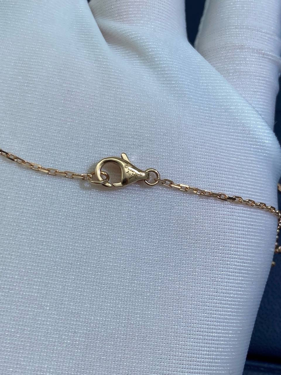 Nail pendant with diamonds