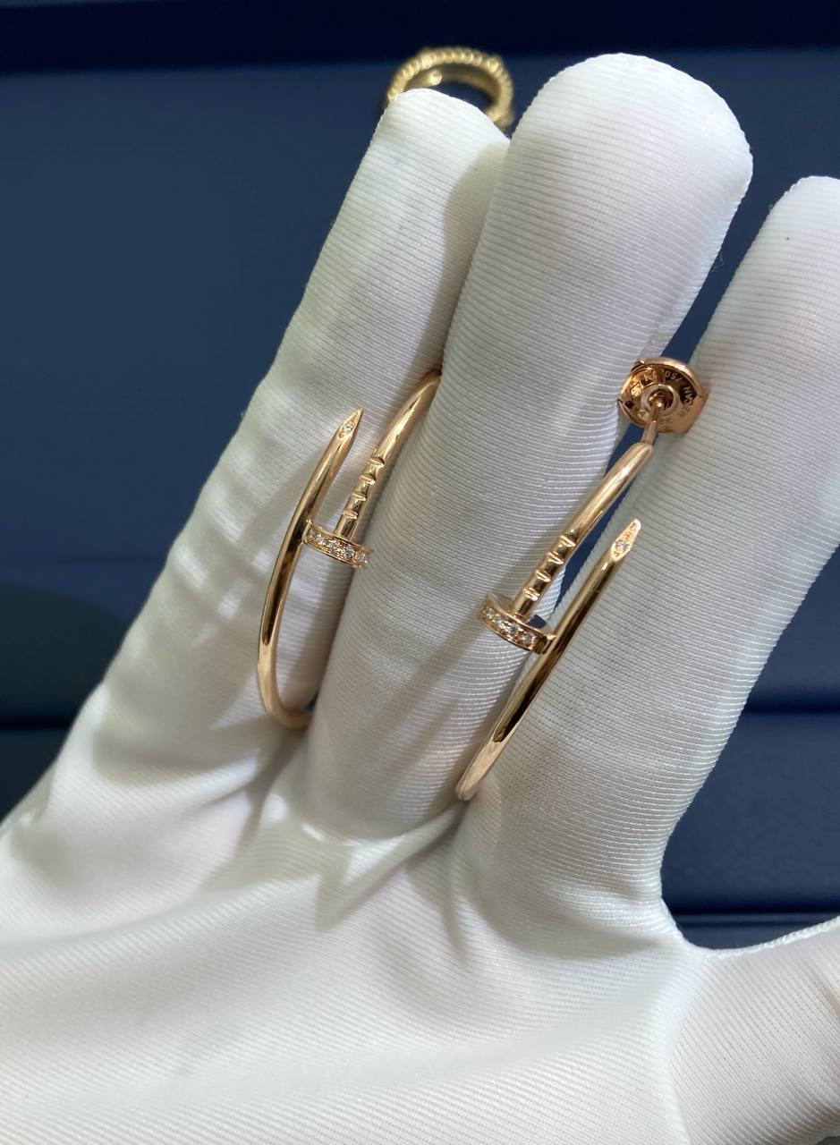 Nail hoop earrings with diamonds