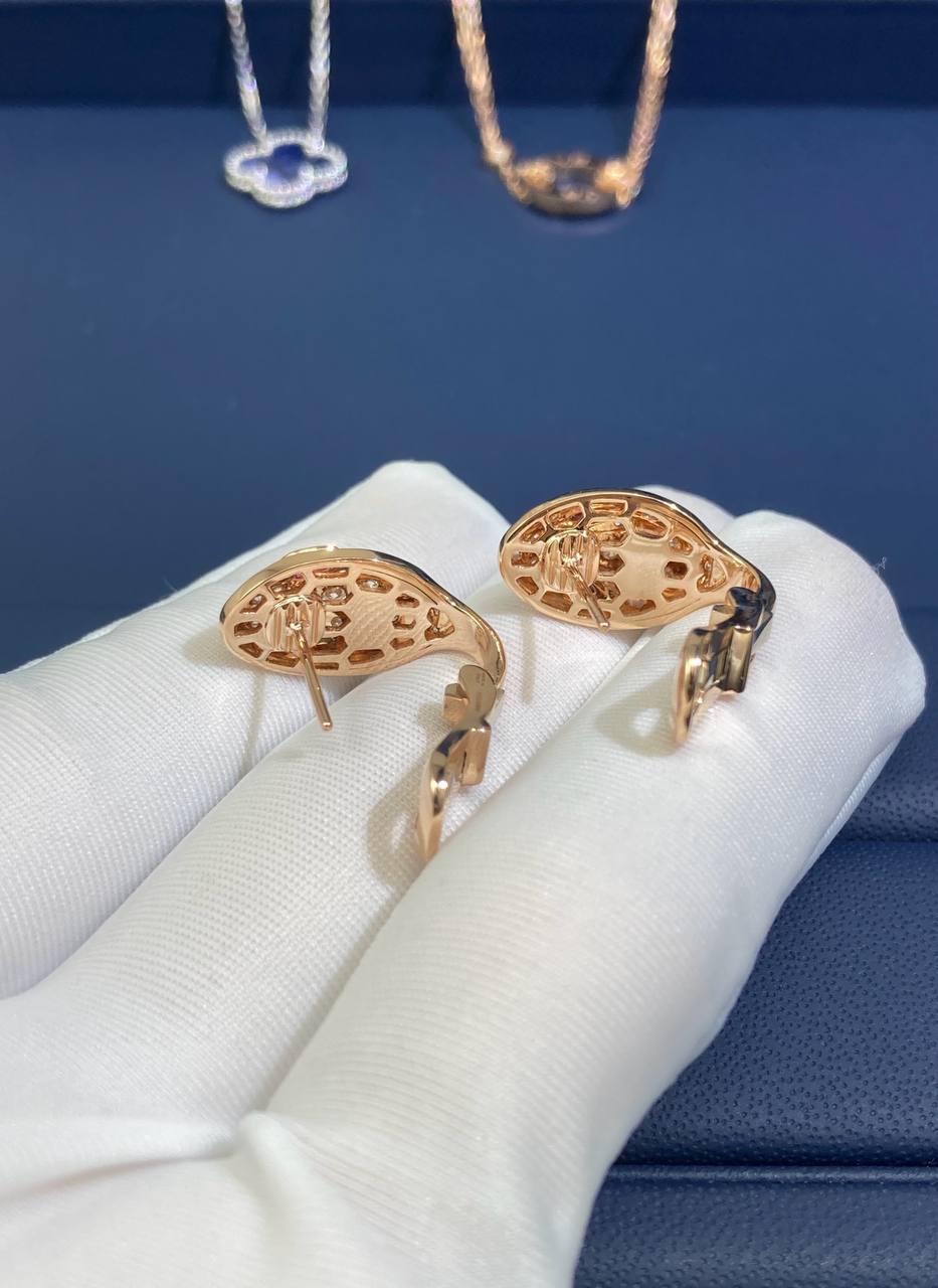 Serpenti earrings with diamonds and rubellites, Small model