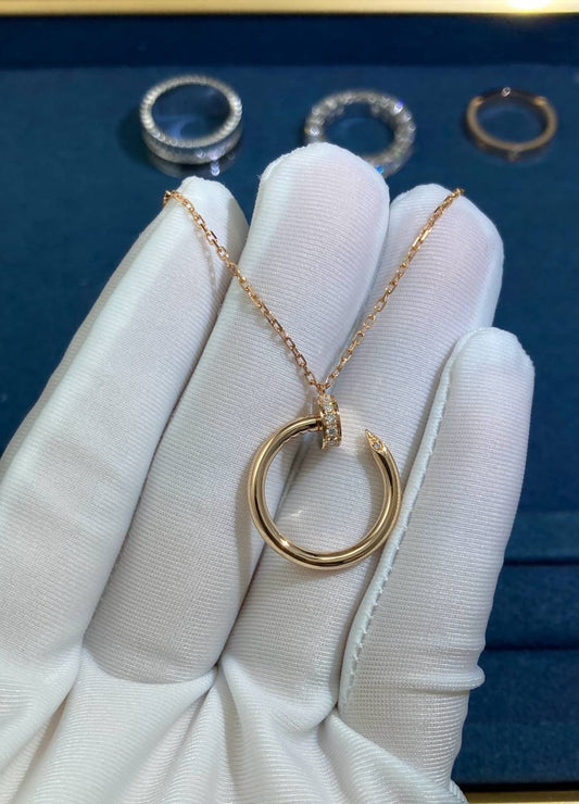 Nail pendant with diamonds