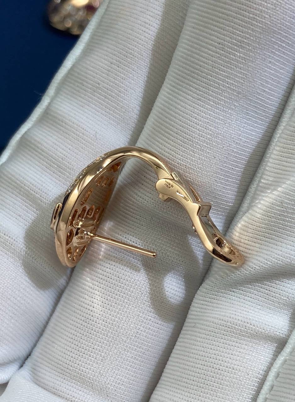 Serpenti earrings with diamonds and rubellites, Small model