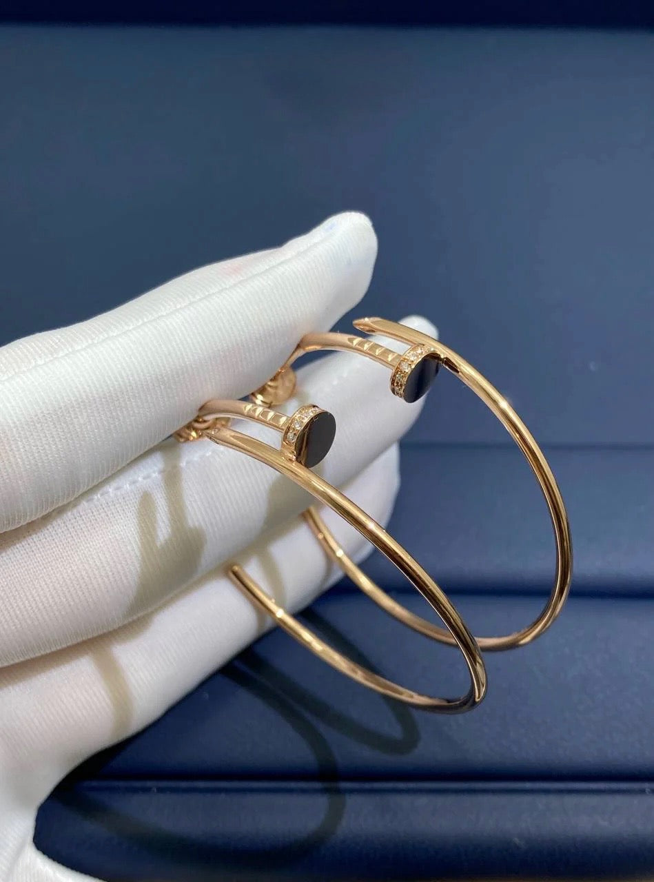 Nail hoop earrings with diamonds