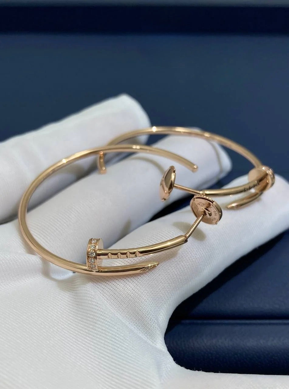 Nail hoop earrings with diamonds