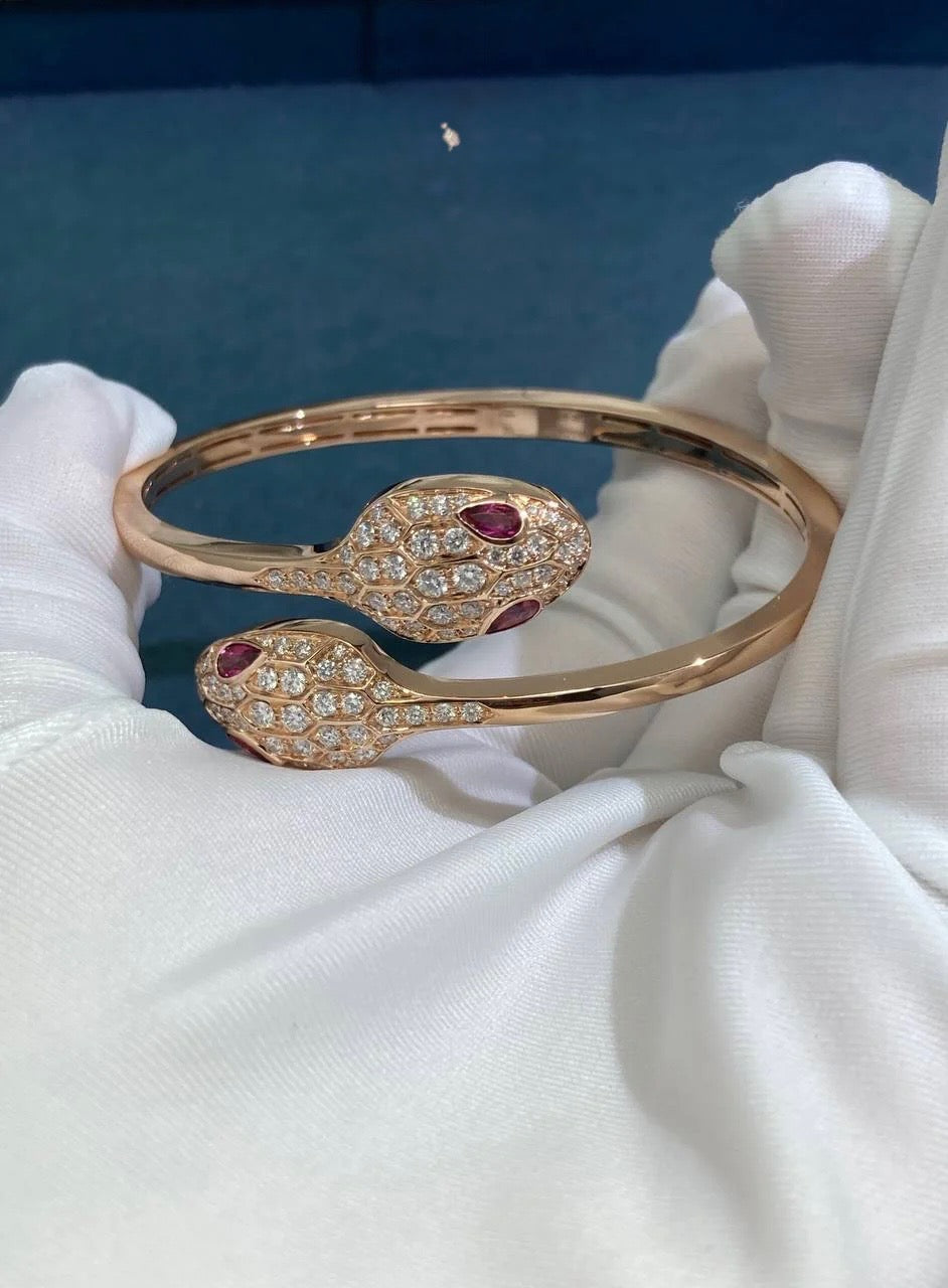 Serpenti double head bracelet with diamonds and rubelllites