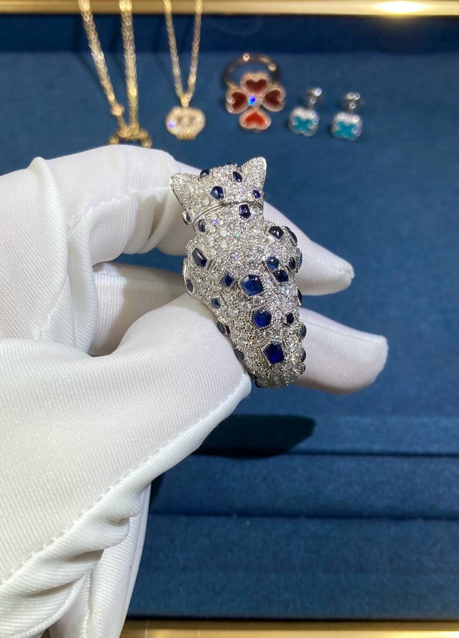 Panther articulated head full pave diamond ring