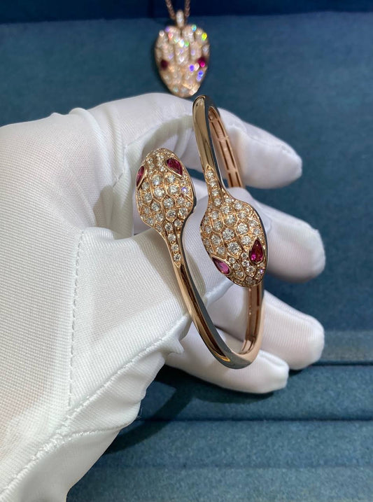 Serpenti double head bracelet with diamonds and rubelllites