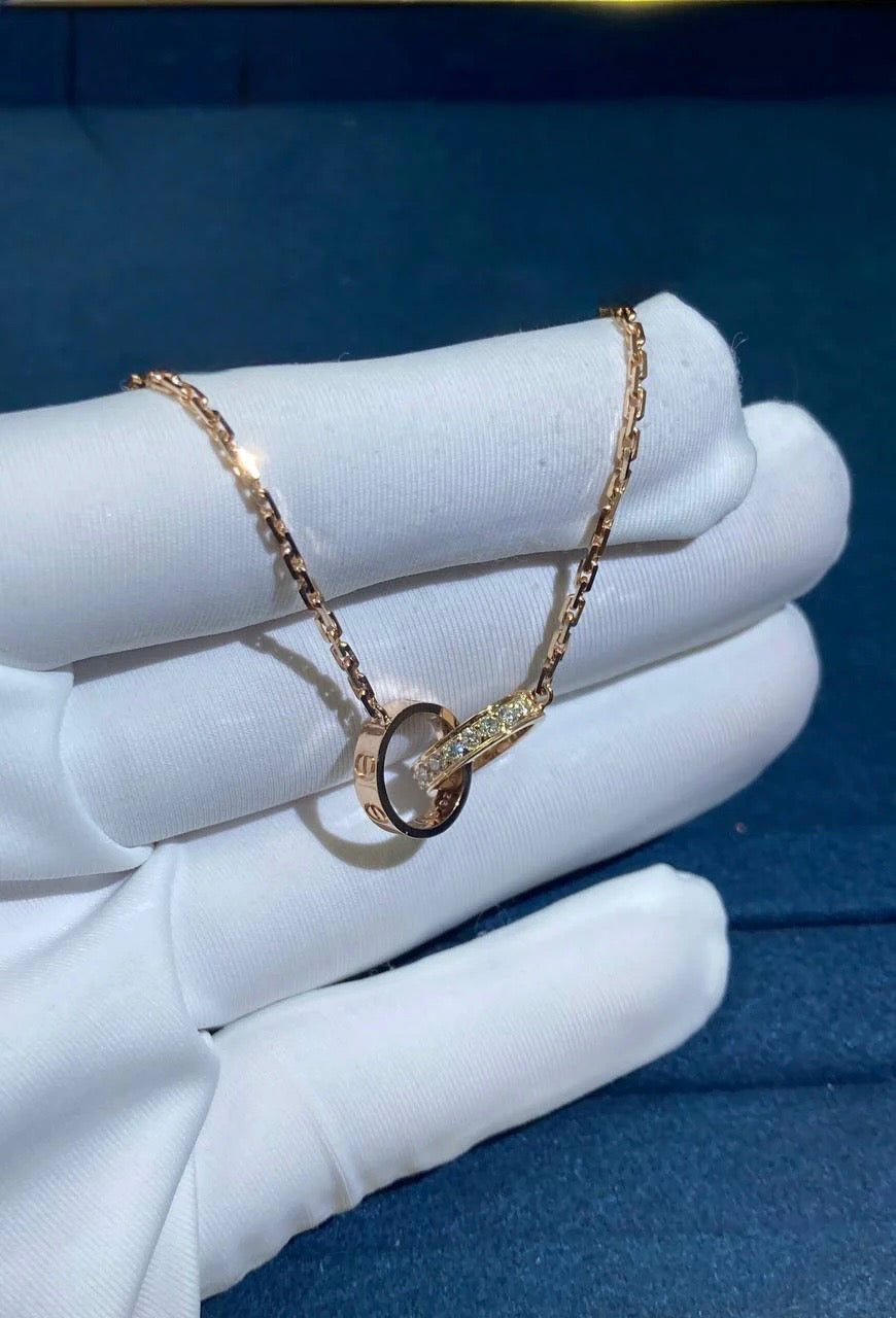 Love half pave diamond double ring chain pendant