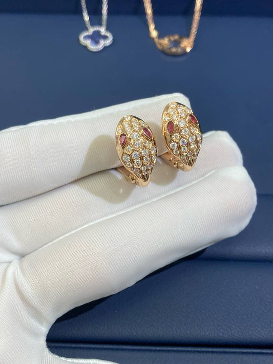 Serpenti earrings with diamonds and rubellites, Small model