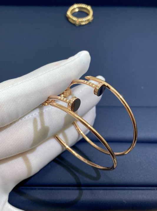 Nail hoop earrings with diamonds