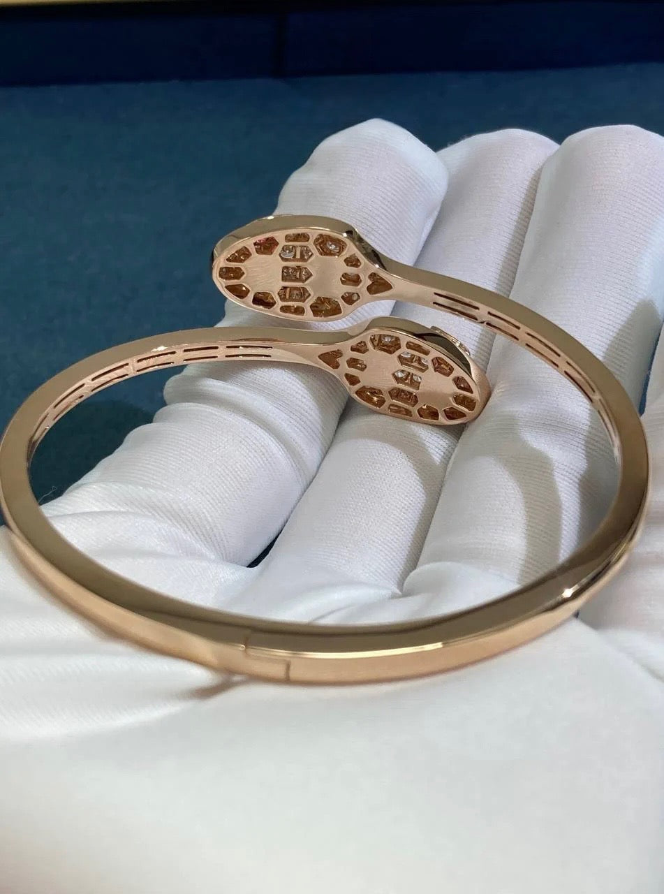 Serpenti double head bracelet with diamonds and rubelllites